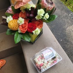 Tropical bouquet and pikake lei
