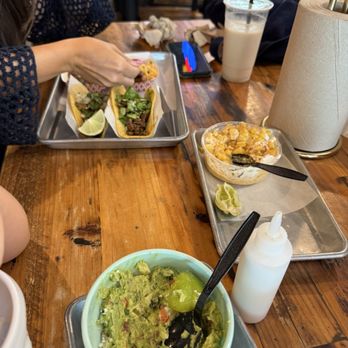 Mexican Cactus Taco Bar - Chips And Guacamole, Elote (Corn In A Cup), and Carne Asada tacos, with an Horchata in the back - Tacos Near Me - Allen, Texas Mexican Cactus Taco Bar - Chips And Guacamole, Elote (Corn In A Cup), and Carne Asada tacos, with an Horchata in the back - Tacos Near Me - Allen, Texas
