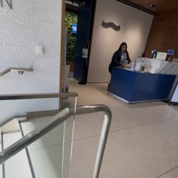 The rude front check-in employee at The Amex Centurion Lounge. The rude front check-in employee at The Amex Centurion Lounge.