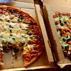 Sam's Ristorante & Pizzeria - $54 for 2 16" pizzas delivered. Taco pizza was a hit, as can be seen by the hand stealing a slice :/