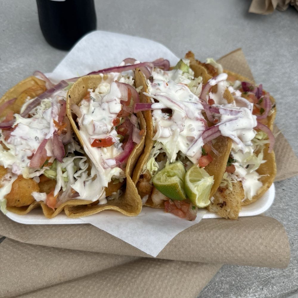 Mariscos Mi Gusto Es - Two fish tacos and two ship tacos ( 2 x garlic and 2 fried) - Mexican Near Me - San Diego, California
