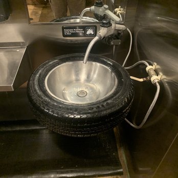 Ford's Garage St. Augustine - Men's restroom sink. - Burgers Near Me - St. Augustine, Florida Ford's Garage St. Augustine - Men's restroom sink. - Burgers Near Me - St. Augustine, Florida