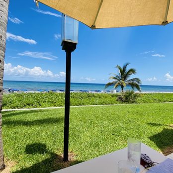 Delray Sands Resort - View of beach from outdoor seating at restaurant - Hotels Near Me - Highland Beach, Florida