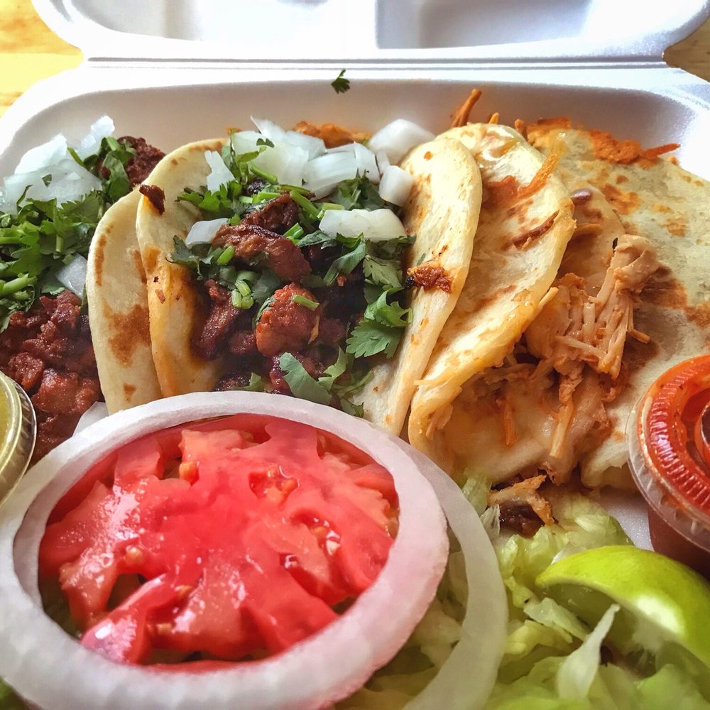 Two tacos al pastor and two chicken quesadillas Two tacos al pastor and two chicken quesadillas