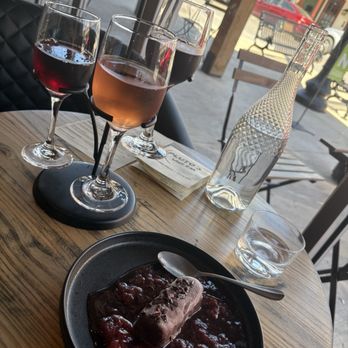 Pluto's Wine Bar - Wine flight and chocolate dessert - Tapas/Small Plates Near Me - Bastrop, Texas