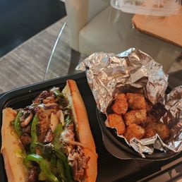 Lunch special: half hoagie with tator tots