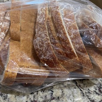 Panera Bread - Loaf of sourdough I purchased to make Monte Cristo sandwiches for guests; it is uneven, jumbled and crushed in places. - Soup Near Me - Prosper, Texas