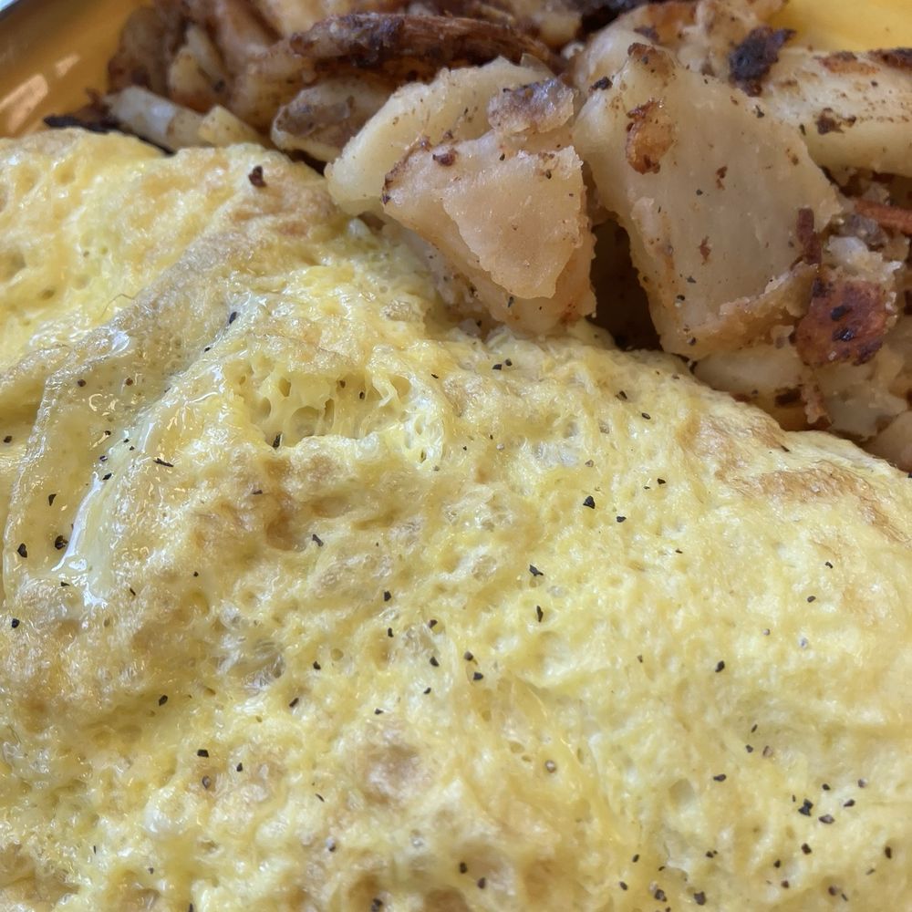 Omelette and home fries Omelette and home fries