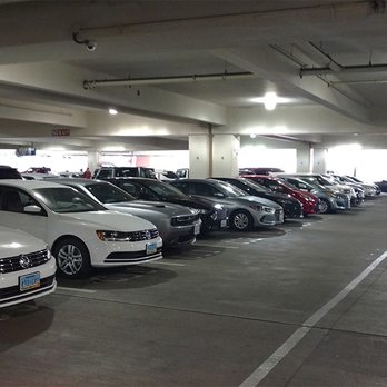 Fox Rent A Car - Remember how they "ran out" of 4door sedans and I would have to pay to upgrade? Look at all these 4door sedans in the parking garage? Magic! - Car Rental Near Me - Phoenix, Arizona