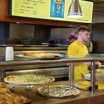 Sal's Pizzeria - A counter of pies is a good thing to see. Pretty much like what you would see in NYC. - Pizza Near Me - West Bend, Wisconsin Sal's Pizzeria - A counter of pies is a good thing to see. Pretty much like what you would see in NYC. - Pizza Near Me - West Bend, Wisconsin