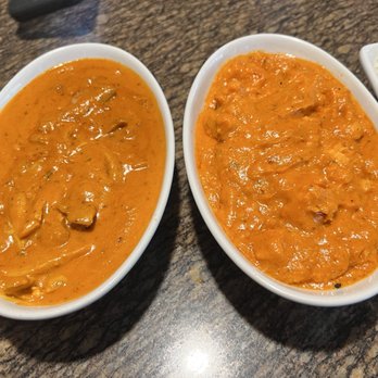 Haldi Indian Cuisine and Bar - Butter Chicken left and Sweet Potato Masala - Indian Near Me - Aurora, Colorado Haldi Indian Cuisine and Bar - Butter Chicken left and Sweet Potato Masala - Indian Near Me - Aurora, Colorado