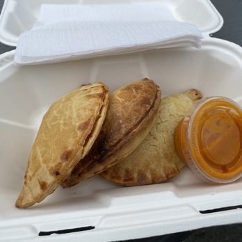 Empanada Gals - a close up of a food item in a styrofoam container - Argentine Near Me - New Westminster, British Columbia Empanada Gals - a close up of a food item in a styrofoam container - Argentine Near Me - New Westminster, British Columbia