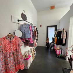 The Design Haus Boutique - Our 25% off rack and our 50% off clearance rack! With selected apparel and shoes!