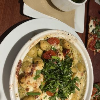 Seasons 52 - Brick-Oven Seasonal Gnocchi with pesto - New American Near Me - Coral Gables, Florida Seasons 52 - Brick-Oven Seasonal Gnocchi with pesto - New American Near Me - Coral Gables, Florida