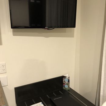 The Reef Resort - TV with luggage rack and pillow storage for pullout couch - Resorts Near Me - Taupo, WKO