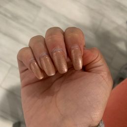 Chunky nails, not very coffin like.