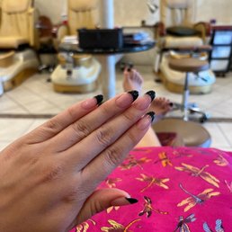 Black acrylics and pedicure Black acrylics and pedicure