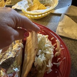 Hard shell taco, across the way is the burrito.