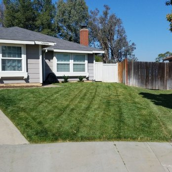 Lawn & Yard Care By Kyle - a house and a fence - Irrigation Near Me Lawn & Yard Care By Kyle - a house and a fence - Irrigation Near Me