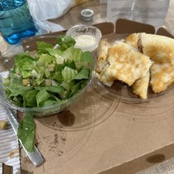 Pizza Hut - Barely cooked crust and cesaer salad.