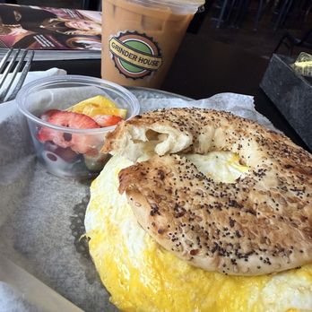 Grinder House Shop - Ham, egg and cheese on an everything bagel. Cold brew coffee with oatmilk and vanilla. - Cafes Near Me - Crossville, Tennessee