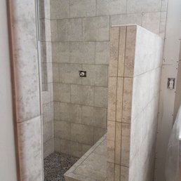 Large walk in shower with pony wall