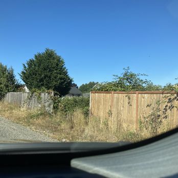 Total Property Management Services - Community fence that has fallen and has not been replaced in well over a year. Note the overgrown weeds and grass as well. - Real Estate Services Near Me - Milton, Washington Total Property Management Services - Community fence that has fallen and has not been replaced in well over a year. Note the overgrown weeds and grass as well. - Real Estate Services Near Me - Milton, Washington