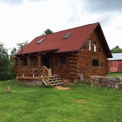 Camp 20 Cabins - Outside the Rustic Luxury cabin (with a classic old red barn in the back)