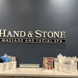 Hand & Stone Massage and Facial Spa - Front desk area.