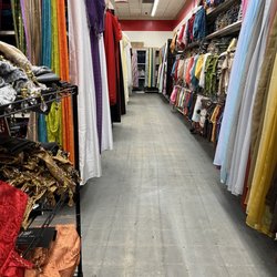 Bargain Discount Store  - Curtain aisle with every color, size and design imaginable.