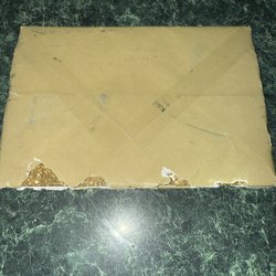 US Post Office - I hope you got disgusting glitter all over your hands as evidence!