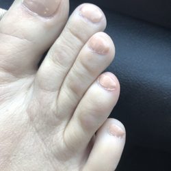 E-Nails and Spa - The worst pedicure I ever had. $25 for someone to wash my feet and paint my nails