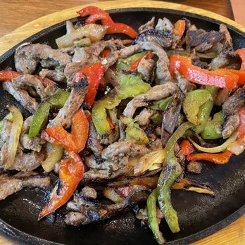 Monroe's Restaurant - a steak and peppers in a skillet - New Mexican Cuisine Near Me - Albuquerque, New Mexico