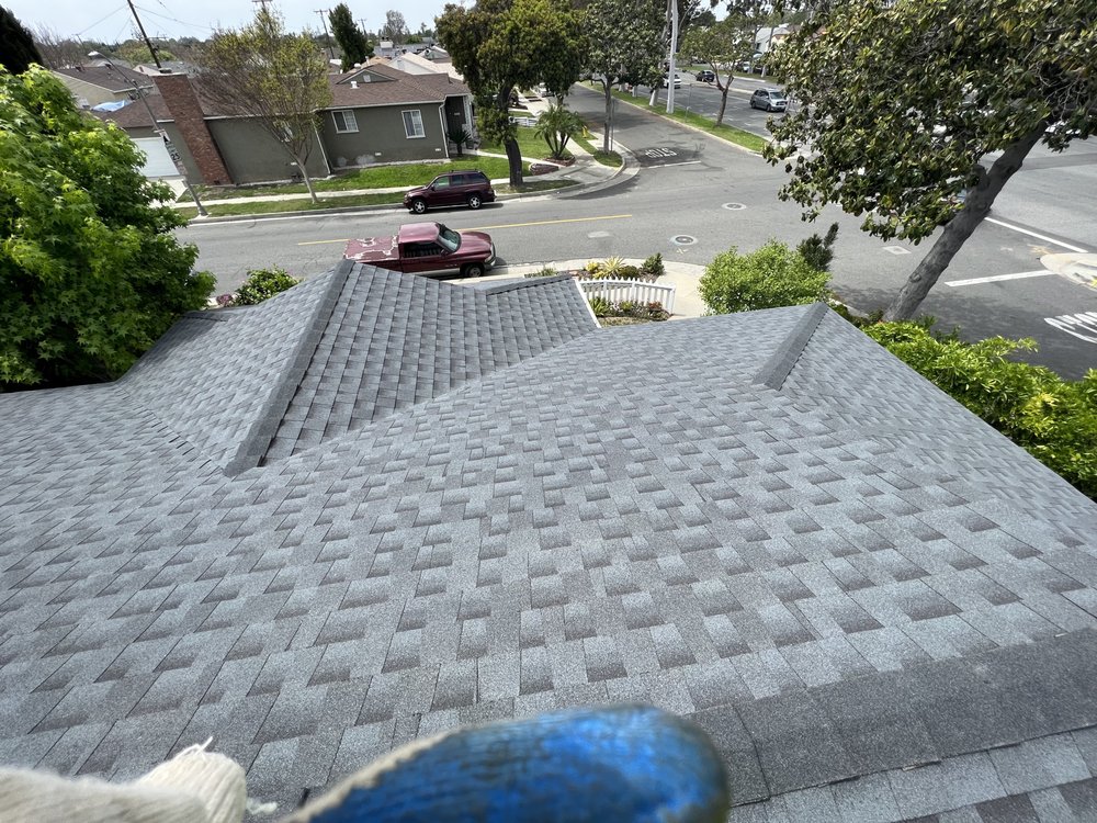 Slide of Millan Roofing Industries