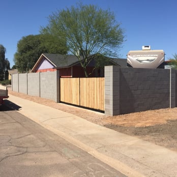 Cornerstone Masonry - Rod iron gate with wood cedar slats on slider installed - Masonry/Concrete Near Me - Apache Junction, Arizona