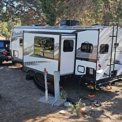 American Eagle RV Park - Huge sites, several have shade. My 19' long truck and 29' trailer fit easily. No need to detach if you are just passing through.