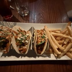 Redz Restaurant - The shrimp tacos with fries. Very good portions and tasty!