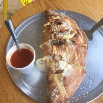 The Brothers Pizza & Grill - Meat lovers calzone with marinara sauce on the side - Pizza Near Me - Pooler, Georgia