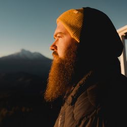 Ben Jennings - Redding REALTOR eXp Realty - Portrait of Ben looking at the sun rise over Mt. Shasta!