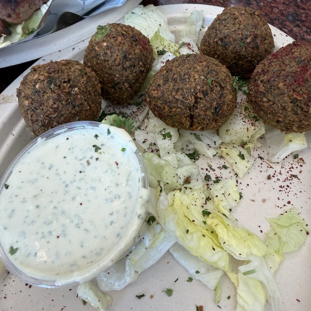 Petra Cafe | Downtown - Partial falafel order (we ate a few already!) - Greek Near Me - Indianapolis, Indiana Petra Cafe | Downtown - Partial falafel order (we ate a few already!) - Greek Near Me - Indianapolis, Indiana