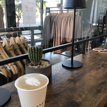 Take Care Coffee - a cup of coffee on a table - Coffee & Tea Near Me - Austin, Texas Take Care Coffee - a cup of coffee on a table - Coffee & Tea Near Me - Austin, Texas