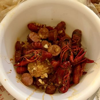 The Boiling Crab - Low level of spice garlic & butter sauce. Crawfish, sausage, corn. - Seafood Near Me - Santa Ana, California The Boiling Crab - Low level of spice garlic & butter sauce. Crawfish, sausage, corn. - Seafood Near Me - Santa Ana, California