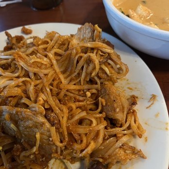 Madam Mam's - Undercooked Pad Thai noodles and watery panag curry. This should be panag water not panag curry - Thai Near Me - Austin, Texas