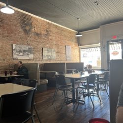 Courtyard Cafe & Bakery - Exposed brick decor. FYI pie is sold out by 2:36pm.