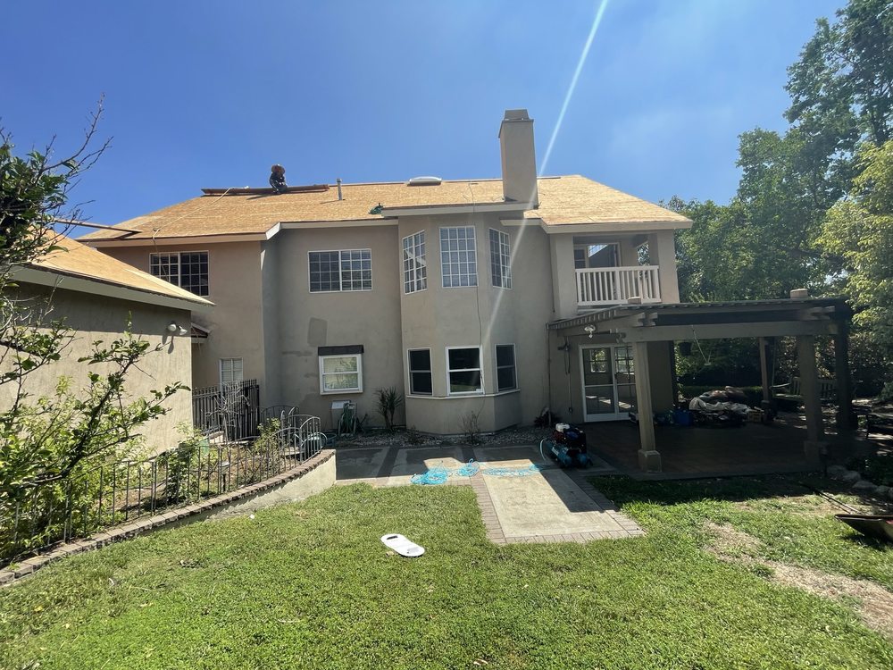 Slide of The Local Friendly Roofer