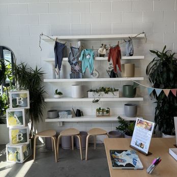 The Preserve - Front area with balloon boxes, shelved wall, extra stools - Venues & Event Spaces Near Me - San Jose, California The Preserve - Front area with balloon boxes, shelved wall, extra stools - Venues & Event Spaces Near Me - San Jose, California