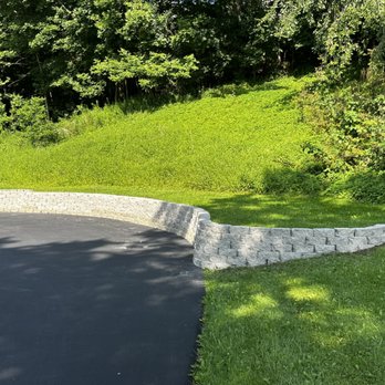 Cog’s General Contracting - New retaining wall (before dirt back fill) - General Contractors Near Me