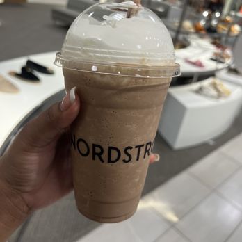 Nordstrom Ebar Artisan Coffee - a hand holding a cup of coffee - Coffee & Tea Near Me - Atlanta, Georgia Nordstrom Ebar Artisan Coffee - a hand holding a cup of coffee - Coffee & Tea Near Me - Atlanta, Georgia