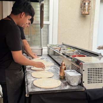 Felice Italian Catering - Making the pizzas - Caterers Near Me