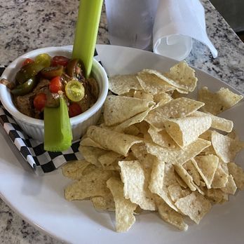 The Buzzard's Roost Bar & Inn - Bagged tortilla chips and black bean hummus. - Bed & Breakfast Near Me - Laurel, Mississippi The Buzzard's Roost Bar & Inn - Bagged tortilla chips and black bean hummus. - Bed & Breakfast Near Me - Laurel, Mississippi